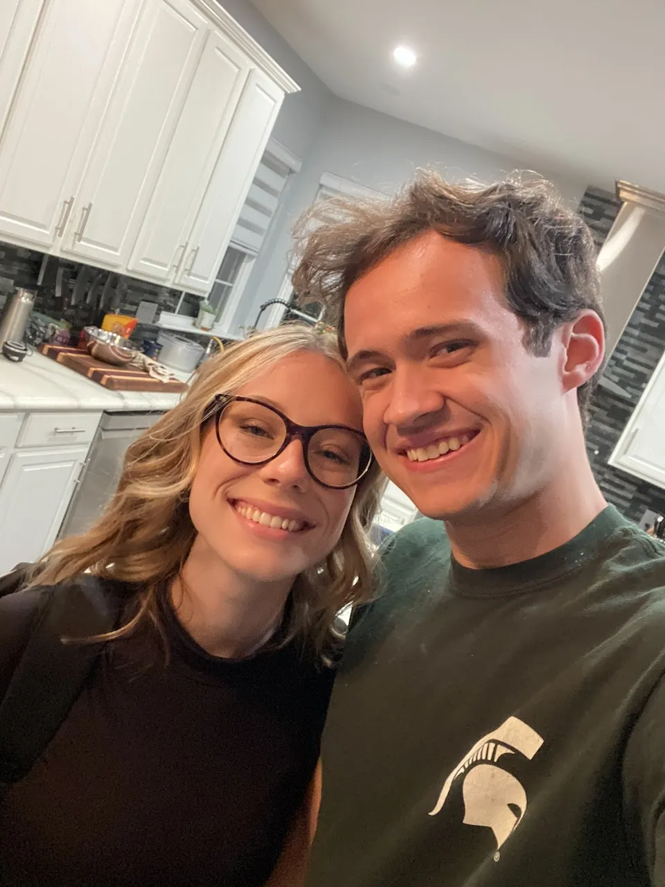 Selfie of Jess and Josh in the kitchen before Jess' first day of student teaching.